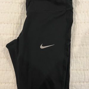 Women’s black Nike running pants